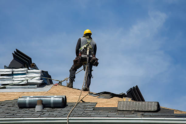 Professional Roof Replacement technician working in Guilderland, NY